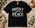 Black Protect Your Peace inspirational T-shirt with white lettering by Keep Your Spirit Alive®